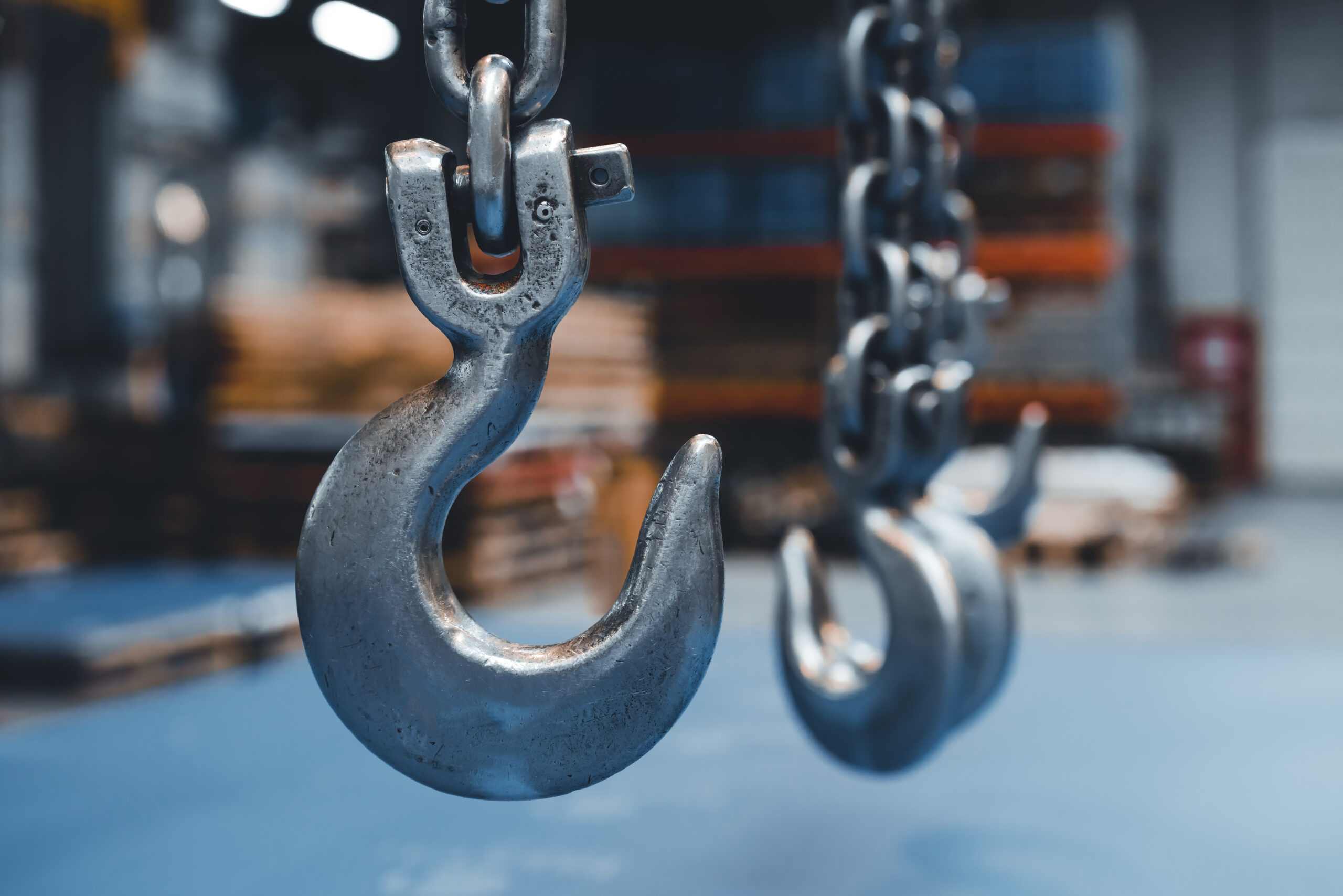 view of lifting hook in an industrial warehouse